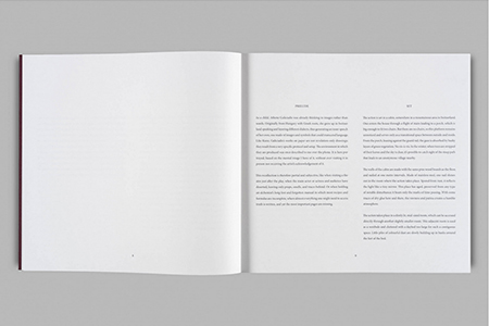 An Acrylic Glass Pyramid and Three Pendulums attached to a Triangle on a Table